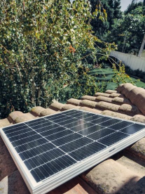 A solar panel for the home on a roof.